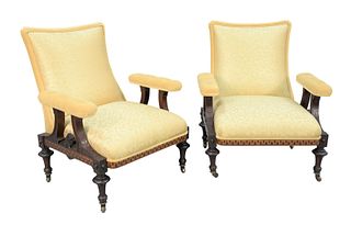 Pair of Renaissance Revival Open Armchairs
with custom upholstered seat, back and arm over Greek key, inlaid frame on turned legs, with brass supporte
