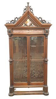 Victorian Walnut Gothic Cabinet
having pierced carved pediment over specimen marble inlays
flanked by two faces over two glass doors flanked by large 