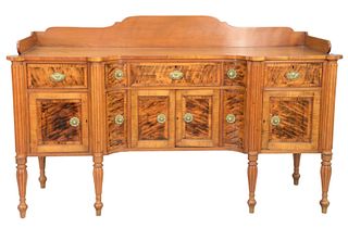 Sheraton Tiger Maple Sideboard
having gallery back on shaped top, over one long center drawer, and two small drawers, flanked by two drawers, over two
