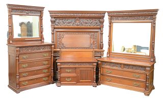 Victorian Mahogany Four Piece Bedroom Set
consisting of carved high back double bed, tall chest, mirror, and commode;
chest, mirror, and commode all w