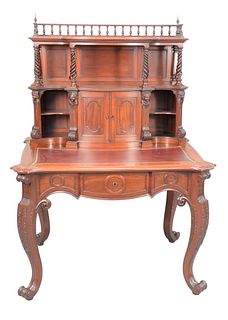 Mahogany Victorian Desk 
with cabinet and shelved back, top shelves supported by openwork, twisted column, over carved faces
all set on lower section,