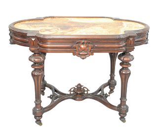 Renaissance Revival Walnut Table
with unusual inset marble on round legs, with center urn and stretchers
(marble professionally repaired and reinforce