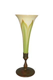 Tiffany Favrile Glass Trumpet Vase
on bronze base, white Favrile vase with green lily decoration
inscribed Tiffany Studios, New York, 1043 to base
hei