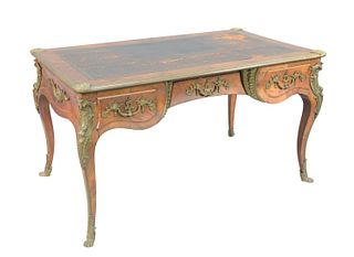 Louis XV Style Bureau Platt 
with original leather writing surface, bronze mounted top corners, drawers, and legs ending in bronze paw feet, (some ven