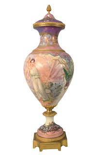 Monumental Sevres Gilt-bronze and Porcelain Urns
having pink ground, hand-painted, young woman with Putti figure on one side and landscape on opposite