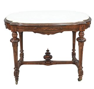 Rosewood Aesthetic Center Table 
with white marble top on turned and fluted legs with stretchers
height 31 1/2 inches, top 27" x 43"
Provenance: Thirt