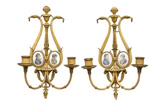 Pair Brass and Paint Decorated Candle Sconces
each with oval enameled portraits and goose head tops
height 15 3/4 inches