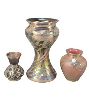 Three Art Glass Vases
each having sterling silver overlay, amethyst bud vase, purple iridescent vase, and a larger iridescent vase with silver overlay
