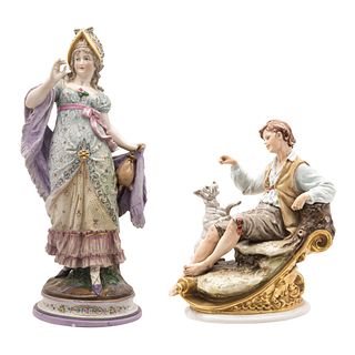 PAR DE FIGURAS DE PORCELANA. SIGLO XX. Porcelana europea decorada a mano.  40 y 20 cm de altura, respectivamente. Piezas: 2.
