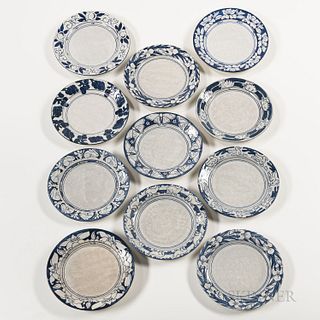 Eleven Dedham Pottery Dinner Plates in Different Patterns, Massachusetts, before 1929, "Rabbit" with Maud Davenport rebus, "Magnolia" w