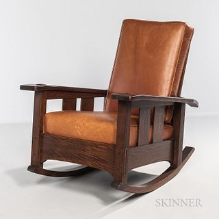 Limbert Reclining Arm Rocking Chair, Grand Rapids, Michigan, c. 1910, quartersawn oak, bent arm over wide double slats, notched bottom