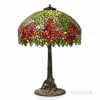 Mosaic Shade Table Lamp, United States, early 20th century, leaded glass shade with floral motif, patinated metal base in the form of a