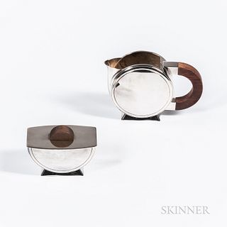 Christofle Art Deco Sugar and Creamer, France, 20th century, circular form with rosewood handles, creamer ht. 4 1/4, sugar ht. 2 3/4 in