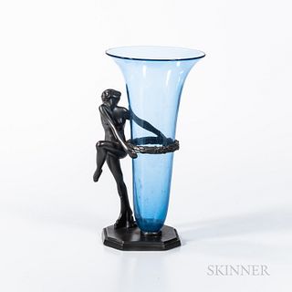 Art Deco Frankart Flower Vase, New York, c. 1930, dancing nude female figure holding a floral ring which supports a transparent blue St