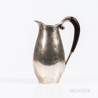 Sterling Silver Pitcher, Mexico, c. 1955, ovoid form with wood loop handle, maker's mark "MA, sterling, eagle mark, 925, Mexico," ht. 9