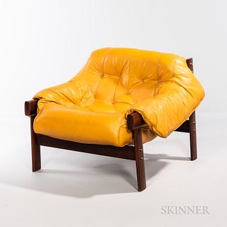 Percival Lafer (Brazilian, b. 1936) Lounge Chair, Brazil, c. 1965, leather and rosewood, with maker's mark impressed in leather, Lafer