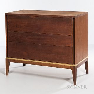 Paul McCobb (1917-1969) Chest of Drawers, United States, c. 1960, walnut and brass, unmarked, ht. 32, wd. 37 1/2, dp. 19 in.Note: While