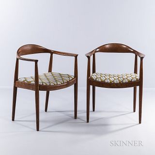 Two Hans J. Wegner "The Chair"-style Armchairs, possibly Denmark, mid to late 20th century, teak, marked with metal Chase Bank property