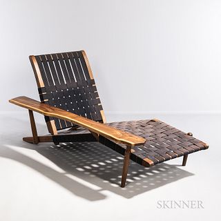 Live-edge Studio Furniture Chaise, United States, late 20th century, walnut and canvas, in the style of Nakashima, ht. 30, wd. 32, dp.