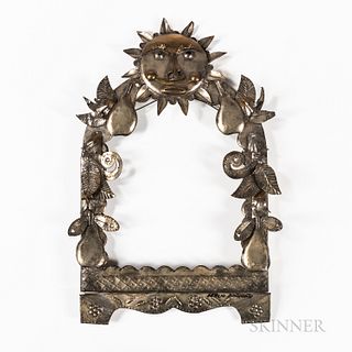 Sergio Bustamante (Mexican, b. 1949) Picture Frame, tinned metal, cresting with a sun face, garlands of pears on the sides, ink signed