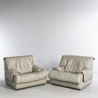 Two Roche Bobois Lounge Chairs, France, late 20th century, leather, maker's name on upholstery under cushion, ht. 30, seat ht. 16, wd.