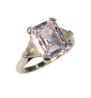 Platinum and Diamond Ring set  with 4.54 carat emerald cut diamond,  flanked by trillion cut diamonds,  Natural/Very Light Pink color, SI1 ,  G.I.A. c