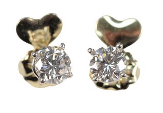 Pair of Diamond Stud Earrings, VS1 and VS2, 1.29 and 1.26 carats, colors G and D, each measuring 6.88 x 6.93 x 4.27 millimeters. GIA report : #2215321