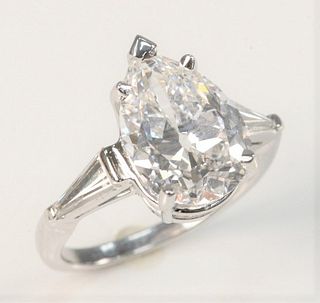 Platinum and Diamond Ring  Set with 5.5 Carat Pear Shaped Diamond,  E color, VS1,  G.I.A. report #2215245457, measuring 14.17 x 9.99 x 6.05 millime