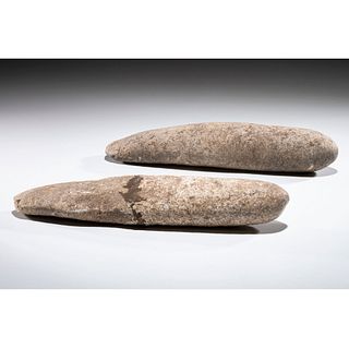A Pair of Limestone Roller Pestles, Largest 13 in.