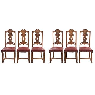 Lote de 6 sillas. Francia. Siglo XX. En talla de madera de nogal. Con respaldos semiabiertos, asientos en vinipiel.