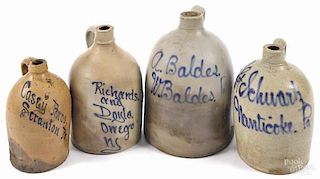 Three Pennsylvania stoneware jugs, 19th c., wit