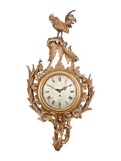 A George II Carved Giltwood Cartel Clock