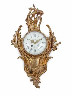 A Louis XVI Style Gilt Bronze Cartel Clock