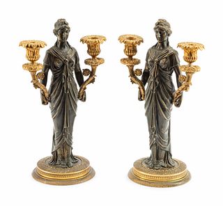 A Pair of Empire Style Gilt and Patinated Bronze Figural Two-Light Candelabra
