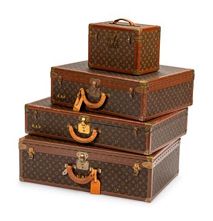 Four Louis Vuitton Hard-Sided Suitcases