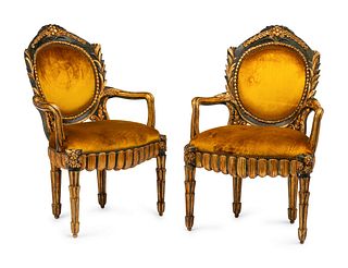 A Pair of Italian Grotto Style Painted and Parcel Gilt Armchairs