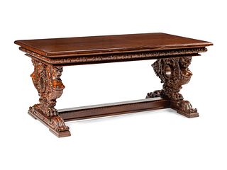 A Renaissance Revival Carved Walnut Library Table