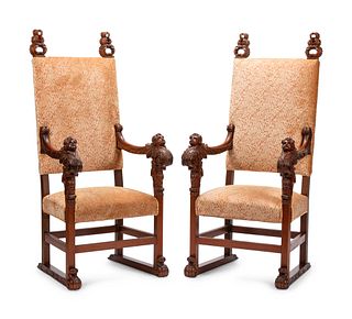 A Pair of Renaissance Style Carved Walnut Armchairs