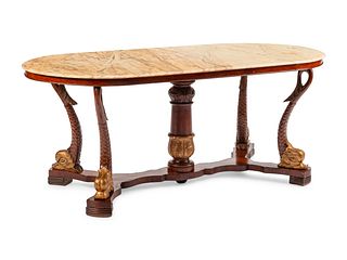 A Northern European Neoclassical Parcel Gilt Mahogany Center Table