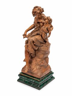 A Continental Terra Cotta Figural Group on a Faux Marble Base