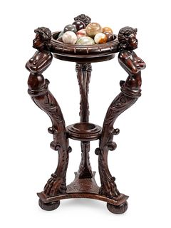 A Continental Carved Wood Jardiniere and Fifteen Marble Ornaments