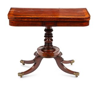 A Regency Crossbanded Mahogany Flip-Top Table
