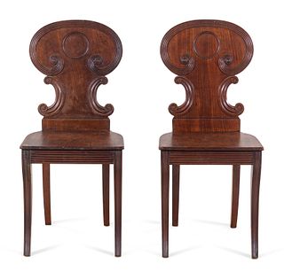A Pair of Regency Style Mahogany Hall Chairs