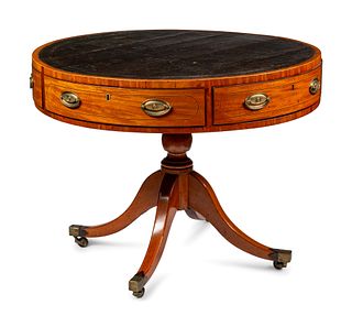 A Regency Mahogany and Satinwood Drum Table