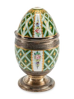 A Continental Silver Mounted Porcelain Egg-Form Box
