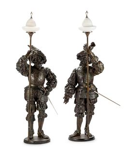 A Pair of Cast Metal Figural Torcheres
