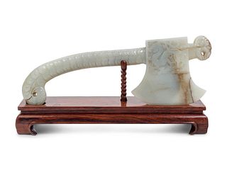 A Chinese Export Carved Jade Axe