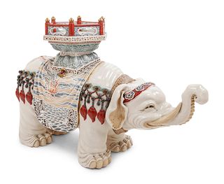 A Chinese Export Porcelain Model of a Caparisoned Elephant with Guanyin