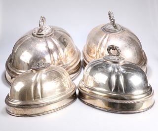 ^ TWO PAIRS OF SILVER-PLATED MEAT COVERS, each pair with en