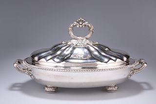 A HANDSOME SILVER-PLATED VEGETABLE TUREEN AND COVER, first 